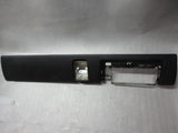 964 993 Dash lower knee protection strip  leatherette black small impression by ashtray fits 1989-98 - 964.552.073.06