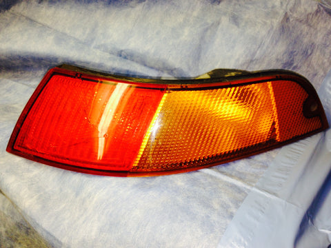 993 European tail light Right Passenger stress cracks amber - 993.631.404.00