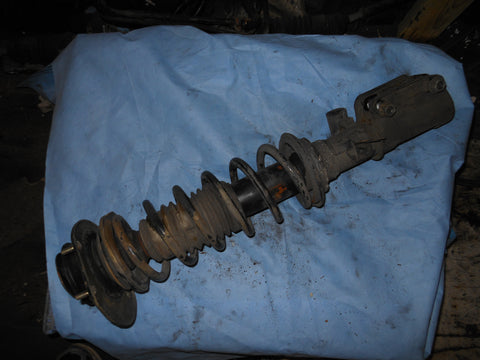 993 Front Strut Right Monroe assembly mount, Hub, plate, wheel carrier

1995-98 Cpe/Turbo - 993.343.042.35