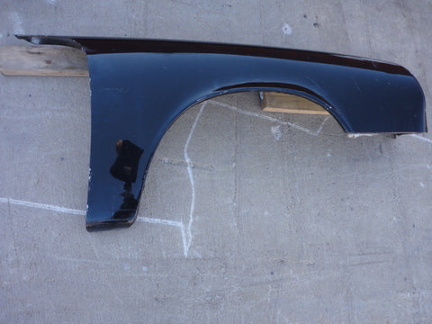 911 Fender right passenger needs repairs 1989 black rippled on rear wheel lip and has bent bolt area - 911.503.032.11