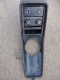 911 Center Console Black leatherette -89 has A/C, rear defrost, hazard and central lock switches and wiring, tab missing, tear on one side needs to be recovered - 911.552.030.50